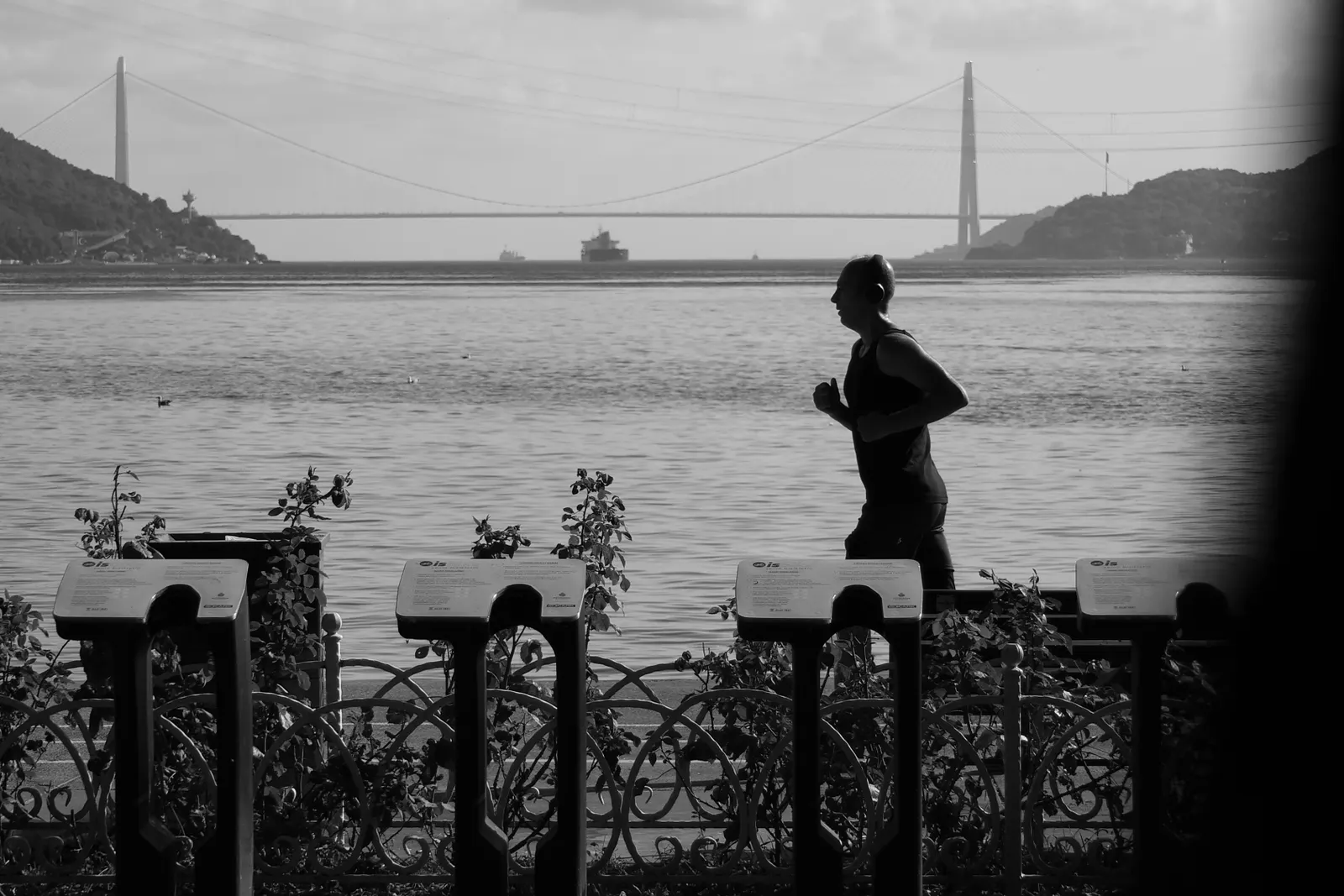 A runner on an outdoor path in the morning